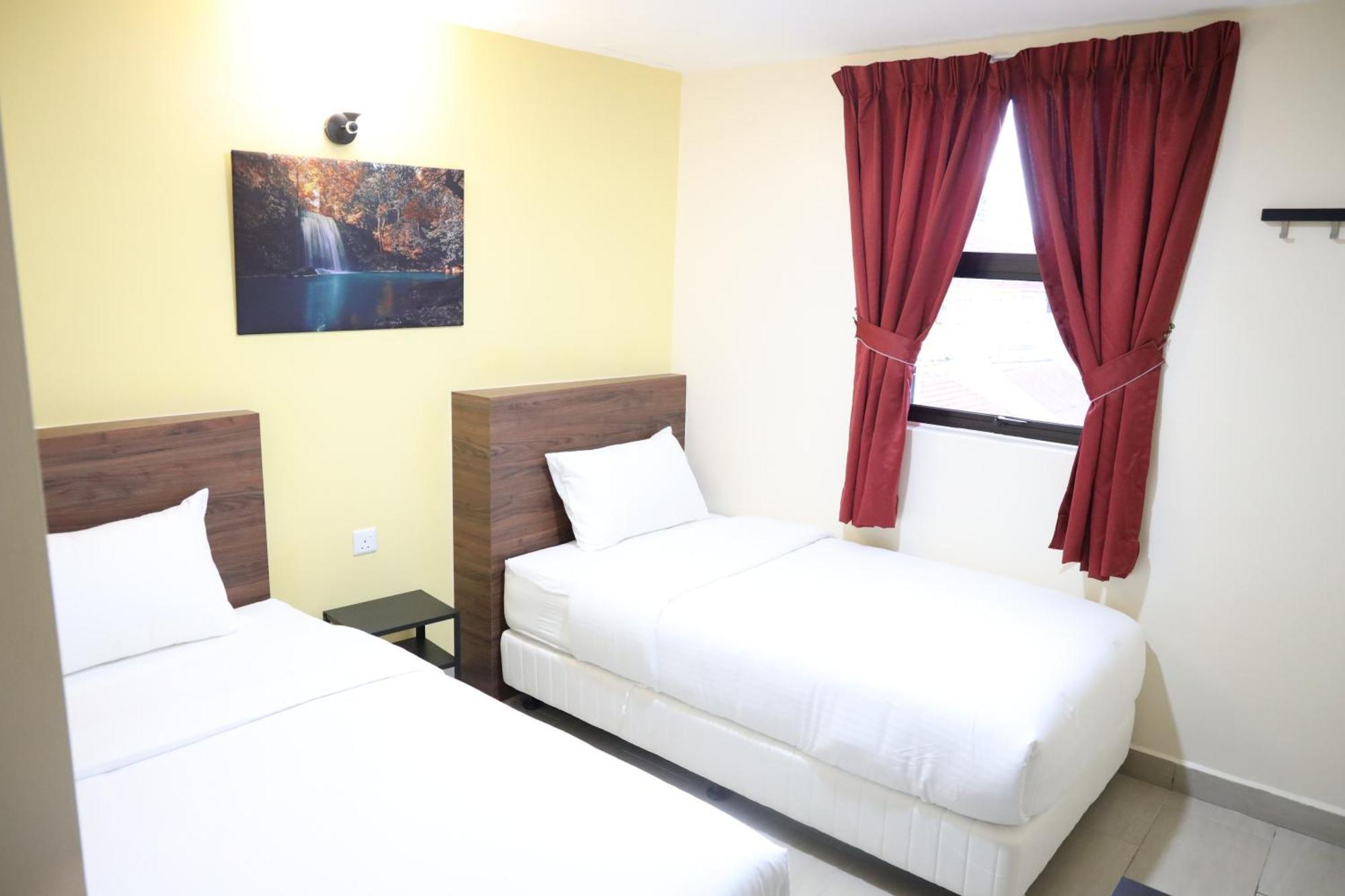 Capital O 90897 Island City Hotel 조지타운 외부 사진